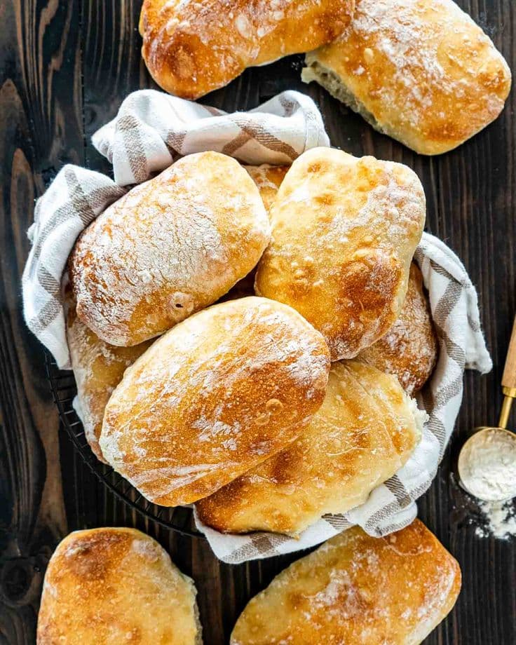 Freshly baked ciabatta bread rolls in a basket