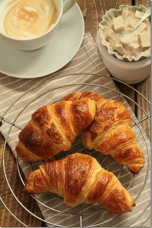 Fresh baked croissants in a basket